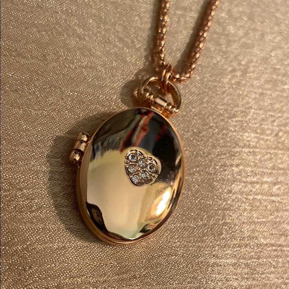 Avon Gold Oval Locket Necklace with Heart Accent - metal oval locket